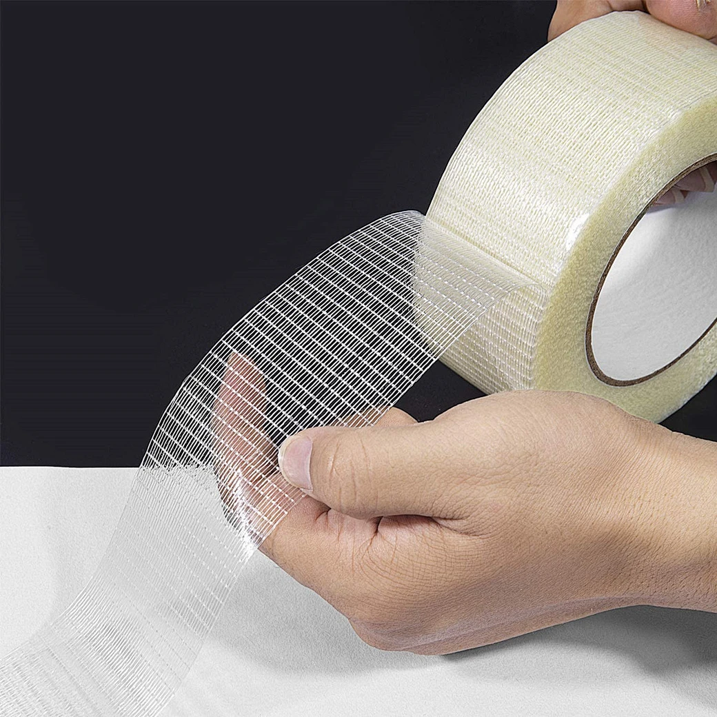 Cross weave tape rolls for industrial carton reinforcement and appliance fixing